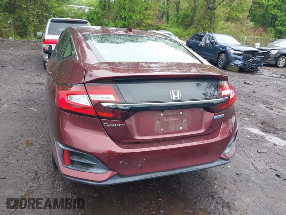2018 Honda Clarity z VIN JHMZC5F12JC021958, wystawiony jako IAAI lot #42191071 z przebiegiem 29 423 mil mil oraz . Historia ofert i sprzedaży dostępna na DreamBid. Obrazek 16.