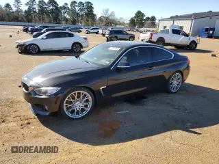 2014 BMW 4 Series 435i with VIN WBA3R1C53EK191776, listed as a Copart auction lot 42410245 with 87,018 mi miles and Salvage Title. Bid and sale history available at carsss.com. Image 1.