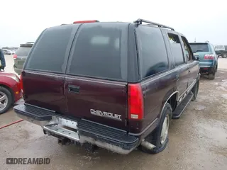 1997 Chevrolet Tahoe with VIN 1GNEK13R8VJ329165, listed as a IAAI auction lot 41631672 with 166,976 mi miles. Bid and sale history available at carsss.com. Image 4.
