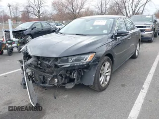 2020 Volkswagen Passat 2.0T SE with VIN 1VWSA7A32LC008611, listed as a IAAI auction lot 41912651 with 104,014 mi miles. Bid and sale history available at carsss.com. Image 2.