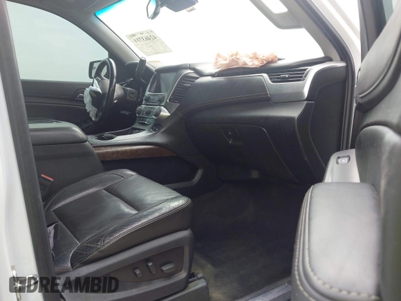 2016 Chevrolet Suburban LT with VIN 1GNSKHKC9GR263027, listed as a IAAI auction lot 42463711 with Not provided miles and . Bid and sale history available at DreamBid. Image 5.