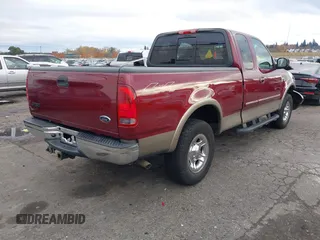 2003 Ford F-150 XL with VIN 2FTRX18L43CA37637, listed as a IAAI auction lot 40911094 with 1 mi miles. Bid and sale history available at carsss.com. Image 4.