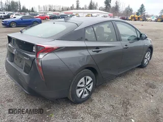 2017 Toyota Prius Two z VIN JTDKARFU1H3047245, wystawiony jako IAAI lot #41736442 z przebiegiem 46 357 mil mil oraz . Historia ofert i sprzedaży dostępna na DreamBid. Obrazek 4.