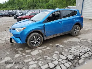 2018 Toyota RAV4 XLE z VIN 2T3RFREV5JW815189, wystawiony jako Copart lot #55140675 z przebiegiem 128 739 mil mil oraz Szkoda całkowita • Salvage title. Historia ofert i sprzedaży dostępna na DreamBid. Obrazek 1.