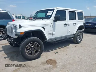 2018 Jeep Wrangler Unlimited Sahara z VIN 1C4HJXEG0JW245118, wystawiony jako IAAI lot #42066614 z przebiegiem 83 743 mil mil oraz . Historia ofert i sprzedaży dostępna na DreamBid. Obrazek 2.