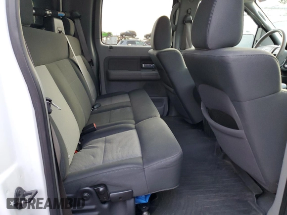 2007 Ford F-150 XLT with VIN 1FTRW14W47KC40614, listed as a Copart auction lot 42415565 with 295,398 mi miles and Salvage title. Bid and sale history available at DreamBid. Image 10.