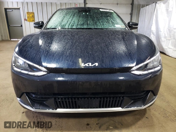 2023 Kia EV6 Wind with VIN KNDC34LA6P5156637, listed as a Copart auction lot 58325614 with 24,848 mi miles and Non Repairable. Bid and sale history available at carsss.com. Image 5.