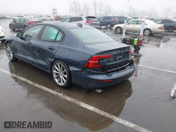 2019 Volvo S60 Momentum with VIN 7JRA22TK2KG013593, listed as a IAAI auction lot 41560933 with 49,619 mi miles. Bid and sale history available at carsss.com. Image 3.