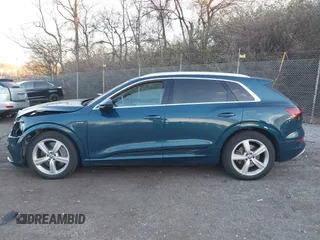 2019 Audi e-tron Prestige with VIN WA1VABGE0KB011579, listed as a IAAI auction lot 41027812 with 41,549 mi miles and . Bid and sale history available at DreamBid. Image 14.
