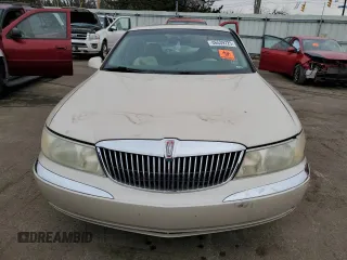 2001 Lincoln Continental with VIN 1LNHM97V11Y681989, listed as a Copart auction lot 46539725 with 107,130 mi miles and Salvage Title. Bid and sale history available at DreamBid. Image 5.