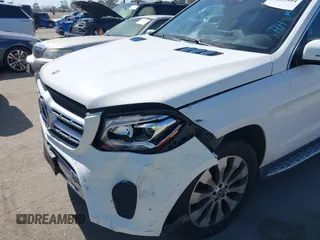2018 Mercedes-Benz GLS 450 with VIN 4JGDF6EE6JB132415, listed as a IAAI auction lot 42283484 with 54,090 mi miles and . Bid and sale history available at DreamBid. Image 6.