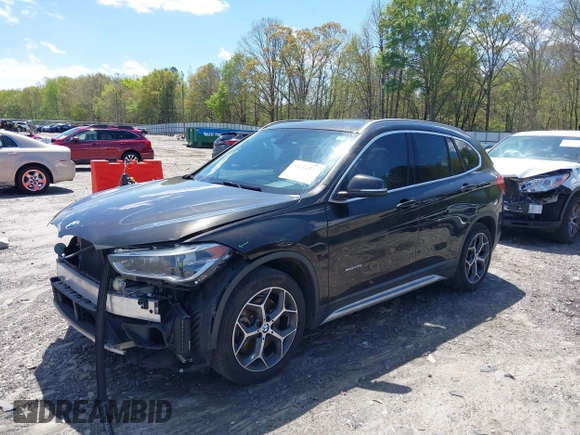 2016 BMW X1 xDrive28i with VIN WBXHT3C3XGP889833, listed as a IAAI auction lot 39118131 with 111,343 mi miles. Bid and sale history available at carsss.com. Image 2.