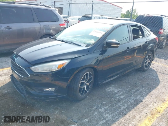 2016 Ford Focus SE with VIN 1FADP3F25GL258603, listed as a IAAI auction lot 42450289 with 73,453 mi miles and . Bid and sale history available at DreamBid. Image 2.