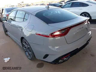 2020 Kia Stinger GT2 with VIN KNAE55LC1L6075699, listed as a IAAI auction lot 41598898 with 58,894 mi miles. Bid and sale history available at carsss.com. Image 3.