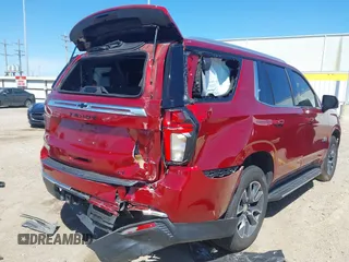 2021 Chevrolet Tahoe LT z VIN 1GNSCNKD1MR316397, wystawiony jako IAAI lot #41805199 z przebiegiem 41 028 mil mil oraz . Historia ofert i sprzedaży dostępna na DreamBid. Obrazek 6.