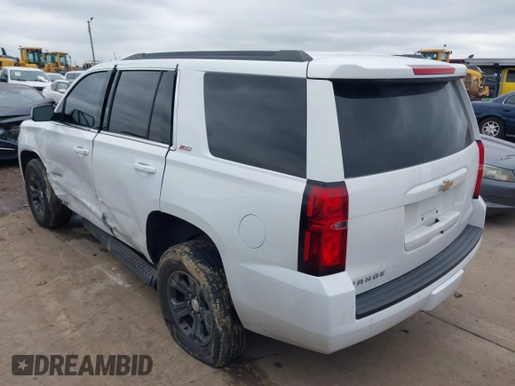 2017 Chevrolet Tahoe LT with VIN 1GNSKBKC1HR401044, listed as a IAAI auction lot 41573362 with 103,865 mi miles and . Bid and sale history available at DreamBid. Image 3.