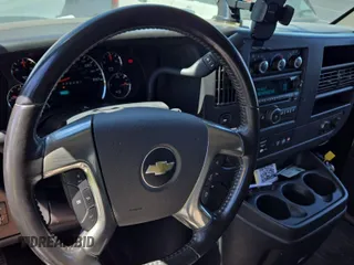 2012 Chevrolet Express Passenger 1LT с VIN 1GAZG1FG2C1159073, выставлен на аукционе IAAI как лот 42619812 с пробегом 90 220 миль миль и . История ставок и продаж доступна на DreamBid. Изображение 3.
