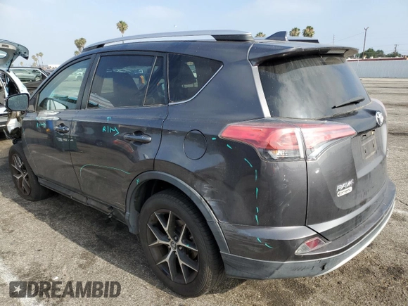 2016 Toyota RAV4 SE with VIN 2T3JFREV9GW453907, listed as a Copart auction lot 60438385 with 59,288 mi miles and Salvage title. Bid and sale history available at DreamBid. Image 2.