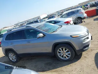 2014 Jeep Cherokee Limited with VIN 1C4PJMDS0EW232018, listed as a IAAI auction lot 41892070 with 224,372 mi miles. Bid and sale history available at carsss.com. Image 13.