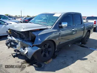 2004 Nissan Titan LE with VIN 1N6AA07A94N532546, listed as a IAAI auction lot 42103434 with 197,461 mi miles and . Bid and sale history available at DreamBid. Image 18.