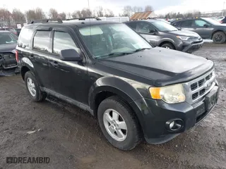 2011 Ford Escape XLT with VIN 1FMCU9D71BKB11351, listed as a IAAI auction lot 41929630 with 151,328 mi miles. Bid and sale history available at carsss.com. Image 1.
