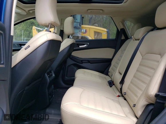 2022 Ford Edge SEL z VIN 2FMPK4J98NBB13788, wystawiony jako Copart lot #54913805 z przebiegiem 25 594 mil mil oraz Szkoda całkowita • Salvage title. Historia ofert i sprzedaży dostępna na DreamBid. Obrazek 11.