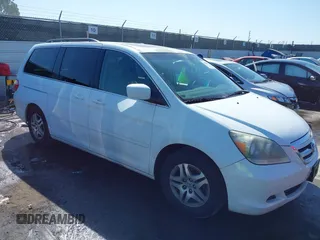 2007 Honda Odyssey EX-L z VIN 5FNRL38607B417218, wystawiony jako IAAI lot #41856212 z przebiegiem 163 720 mil mil oraz . Historia ofert i sprzedaży dostępna na DreamBid. Obrazek 1.