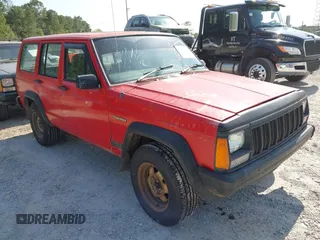 1996 Jeep Cherokee z VIN 1J4FB28S4TL145447, wystawiony jako IAAI lot #42414080 z przebiegiem 437 448 mil mil oraz . Historia ofert i sprzedaży dostępna na DreamBid. Obrazek 1.