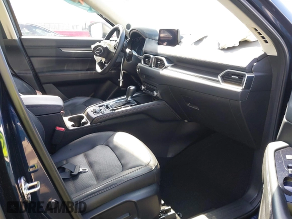 2020 Mazda CX-5 Grand Touring with VIN JM3KFADM6L1830093, listed as a IAAI auction lot 41699672 with 66,769 mi miles. Bid and sale history available at carsss.com. Image 5.
