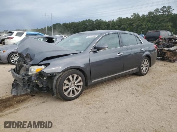 2011 Toyota Avalon with VIN 4T1BK3DBXBU413941, listed as a Copart auction lot 57725185 with 130,348 mi miles and Salvage title. Bid and sale history available at DreamBid. Image 1.