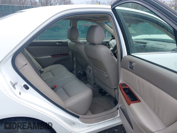 2005 Toyota Camry LE with VIN JTDBF30KX50165586, listed as a IAAI auction lot 41948322 with 84,326 mi miles and . Bid and sale history available at DreamBid. Image 8.