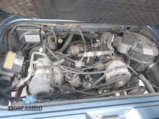 1989 Volkswagen Vanagon with VIN WV2YB0252KH059286, listed as a IAAI auction lot 42137080 with 130,604 mi miles and . Bid and sale history available at DreamBid. Image 10.