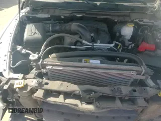 2019 Ram 1500 Lone Star z VIN 1C6RR6LT4KS539516, wystawiony jako Copart lot #57354655 z przebiegiem 135 846 mil mil oraz Szkoda całkowita • Salvage title. Historia ofert i sprzedaży dostępna na DreamBid. Obrazek 14.