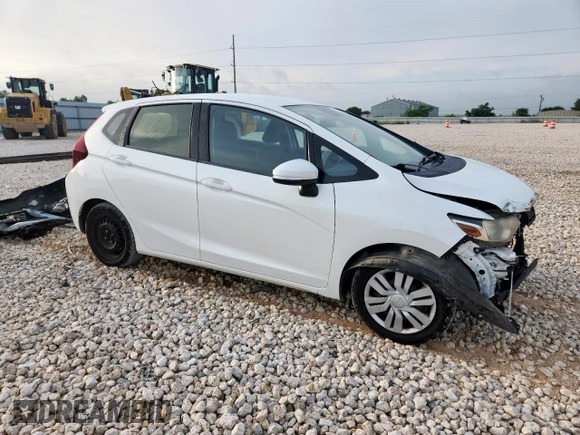 2016 Honda Fit LX with VIN JHMGK5H5XGX018043, listed as a Copart auction lot 59995695 with 53,297 mi miles and Salvage title. Bid and sale history available at DreamBid. Image 4.