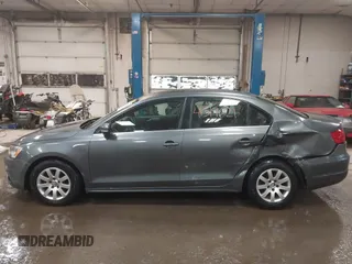 2014 Volkswagen Jetta TDI w/Premium with VIN 3VWLL7AJ4EM425825, listed as a IAAI auction lot 41519621 with 154,486 mi miles and . Bid and sale history available at DreamBid. Image 14.