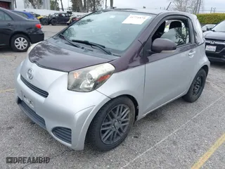 2014 Scion iQ with VIN JTNJJXB01EJ028930, listed as a IAAI auction lot 41771879 with 113,364 mi miles. Bid and sale history available at carsss.com. Image 2.