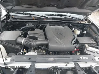 2018 Toyota Tacoma SR with VIN 3TMCZ5AN4JM148581, listed as a IAAI auction lot 41462945 with 115,655 mi miles. Bid and sale history available at carsss.com. Image 10.