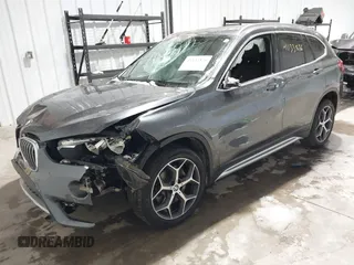 2018 BMW X1 xDrive28i with VIN WBXHT3C38J5L34625, listed as a IAAI auction lot 41133876 with 60,986 mi miles and . Bid and sale history available at DreamBid. Image 18.