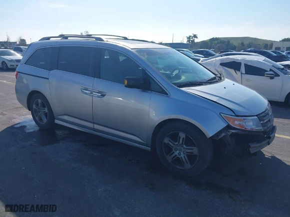 2012 Honda Odyssey Touring with VIN 5FNRL5H90CB066469, listed as a IAAI auction lot 41463009 with NaN miles. Bid and sale history available at carsss.com. Image 1.