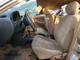 1997 Ford Escort LX z VIN 1FALP13P4VW361362, wystawiony jako Copart lot #47134155 z przebiegiem 56 149 mil mil oraz Szkoda całkowita • Salvage title. Historia ofert i sprzedaży dostępna na DreamBid. Obrazek 7.