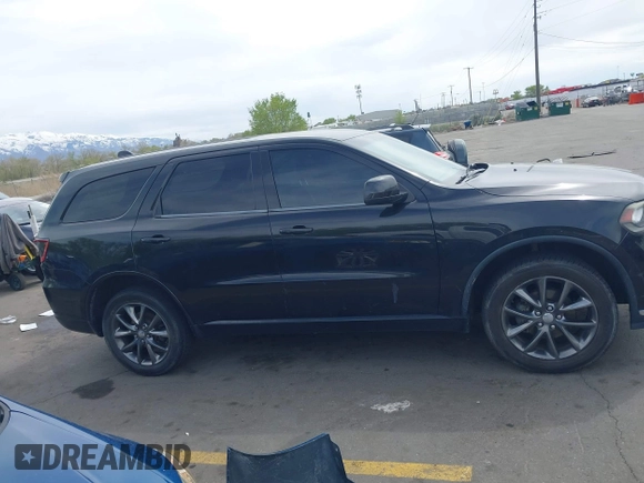 2015 Dodge Durango SXT with VIN 1C4RDJAGXFC796034, listed as a IAAI auction lot 42057983 with 159,108 mi miles and . Bid and sale history available at DreamBid. Image 13.