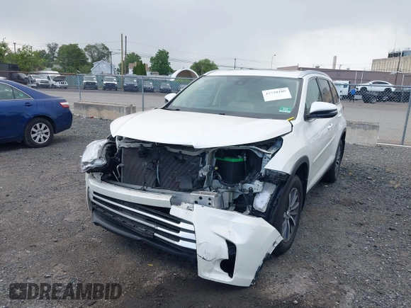 2019 Toyota Highlander SE with VIN 5TDJZRFH1KS567376, listed as a IAAI auction lot 42728105 with 58,970 mi miles and . Bid and sale history available at DreamBid. Image 6.