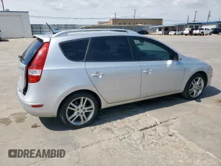 2012 Hyundai Elantra Touring SE with VIN KMHDC8AE6CU147482, listed as a Copart auction lot 48552545 with 142,384 mi miles and Salvage Title. Bid and sale history available at carsss.com. Image 3.