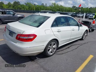 2011 Mercedes-Benz E-Class E 350 Luxury with VIN WDDHF8HB0BA422696, listed as a IAAI auction lot 42006732 with 147,653 mi miles. Bid and sale history available at carsss.com. Image 4.