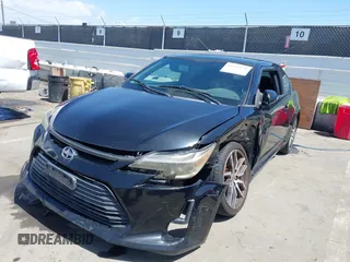 2014 Scion tC with VIN JTKJF5C71E3072199, listed as a IAAI auction lot 41956178 with 154,730 mi miles. Bid and sale history available at carsss.com. Image 6.