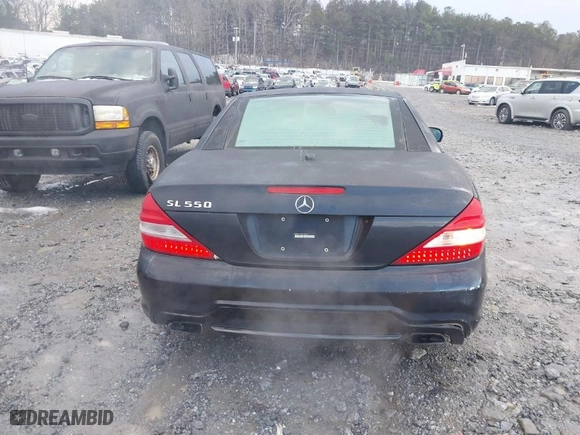2009 Mercedes-Benz SL-Class V8 with VIN WDBSK71F29F143653, listed as a IAAI auction lot 41310556 with 115,377 mi miles. Bid and sale history available at carsss.com. Image 16.