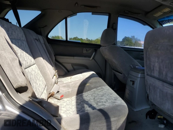 2007 Kia Sorento LX z VIN KNDJD736475695369, wystawiony jako Copart lot #53079175 z przebiegiem 215 324 mil mil oraz Szkoda całkowita • Salvage title. Historia ofert i sprzedaży dostępna na DreamBid. Obrazek 12.