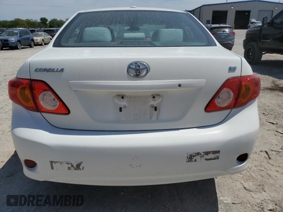 2010 Toyota Corolla with VIN 2T1BU4EE2AC329301, listed as a Copart auction lot 52970705 with 197,823 mi miles and Salvage Title. Bid and sale history available at DreamBid. Image 6.