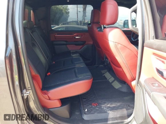 2019 Ram 1500 Rebel z VIN 1C6SRFLT2KN696557, wystawiony jako IAAI lot #42110931 z przebiegiem 81 372 mil mil oraz . Historia ofert i sprzedaży dostępna na DreamBid. Obrazek 8.
