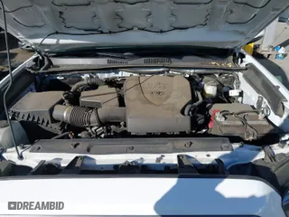 2021 Toyota Tacoma 2WD SR5 with VIN 3TMAZ5CN7MM144212, listed as a IAAI auction lot 41286049 with 75,113 mi miles. Bid and sale history available at carsss.com. Image 10.